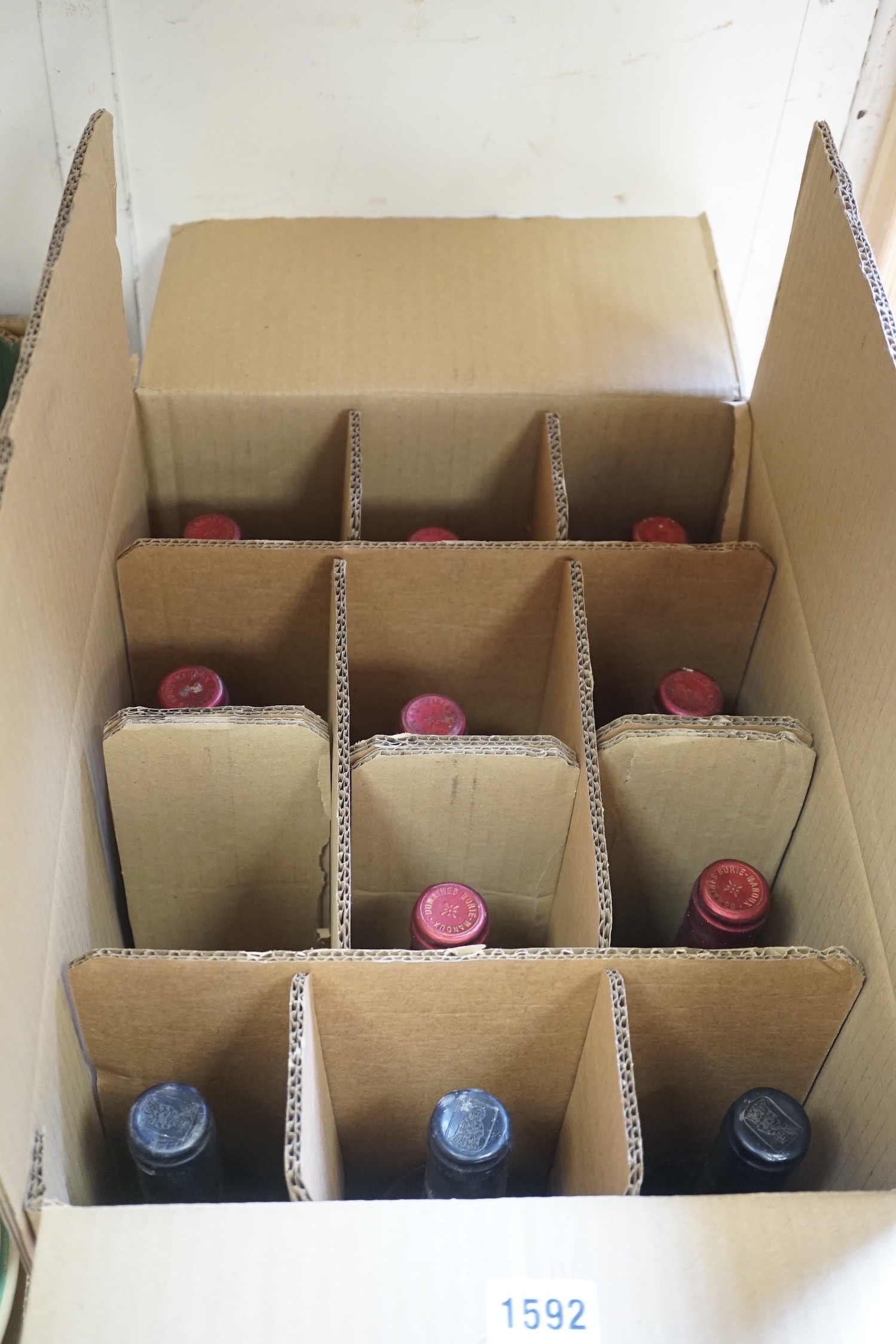 Eight bottles of Chateau Haut-Bages Monpelou 1983, a bottle of Chateau La Couspaude Saint Emilion 1982 and 3 bottles of Couvent des Jacobins Saint Emilion Grand Cru Classe 1982